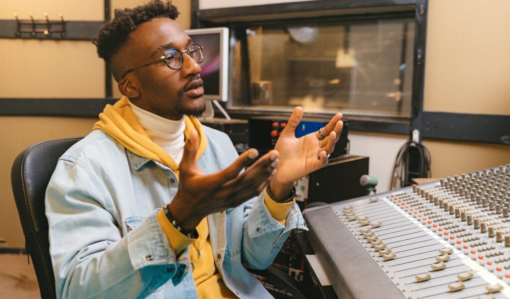 Man Sitting near Control Panel Pexels Anthonyshkraba Production 8412343 Recording studio internship