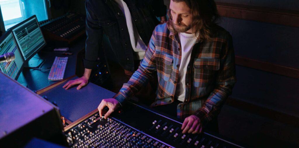 Men in the Recording Studio in Front of the Mixing Board Pexels Cottonbro 7087608