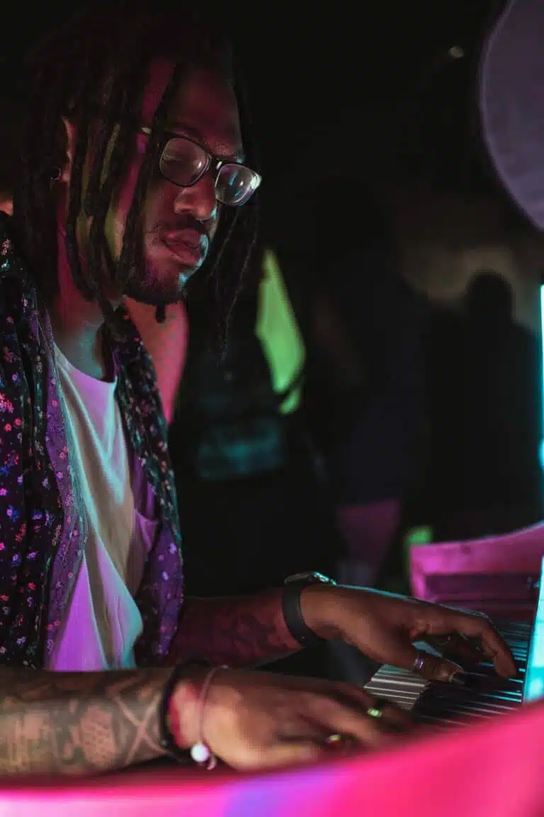 Black man playing keys