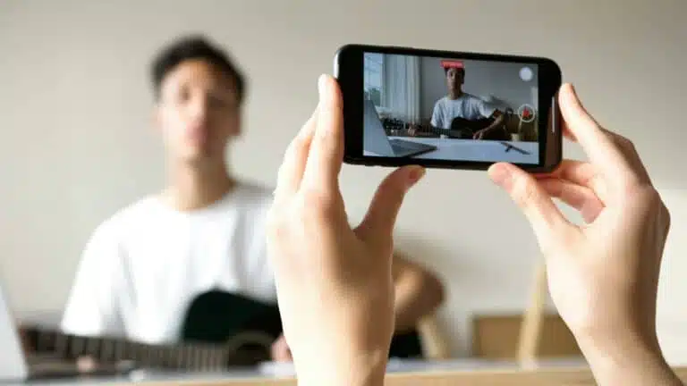 Guitarist being recorded 