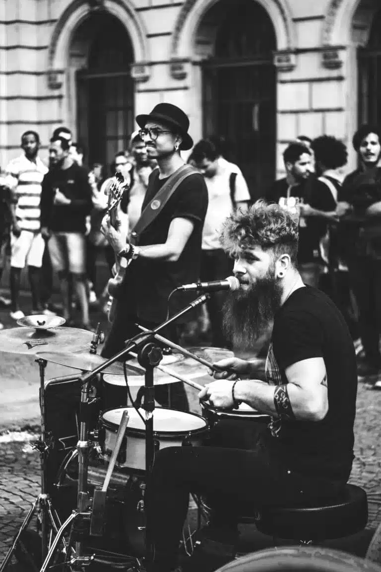black and white photo of street musicians 