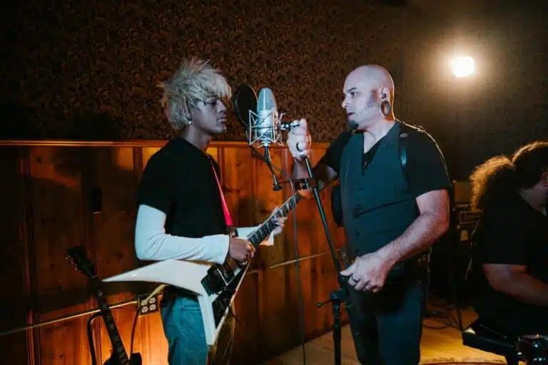 Emo band and producer in the studio 