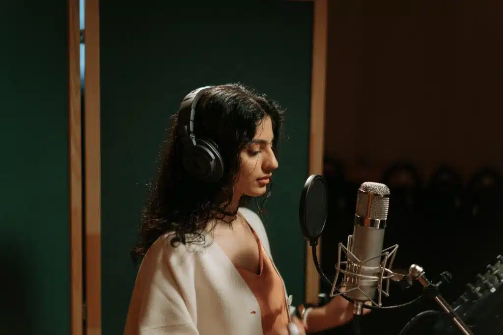 recording studio rental A Female Artist Recording a Song
